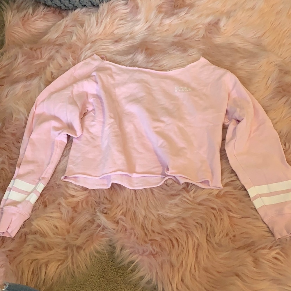 Cropped pink sweater.